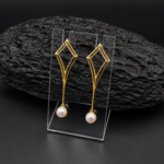 pend.perl.rombo.oro Pendientes Instinto Perla